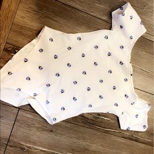 Small white off the shoulder floral body suit